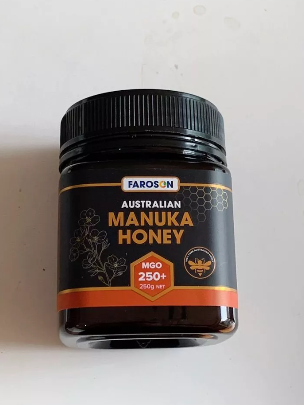 Jar of Farason Australian Manuka Honey on a light background
