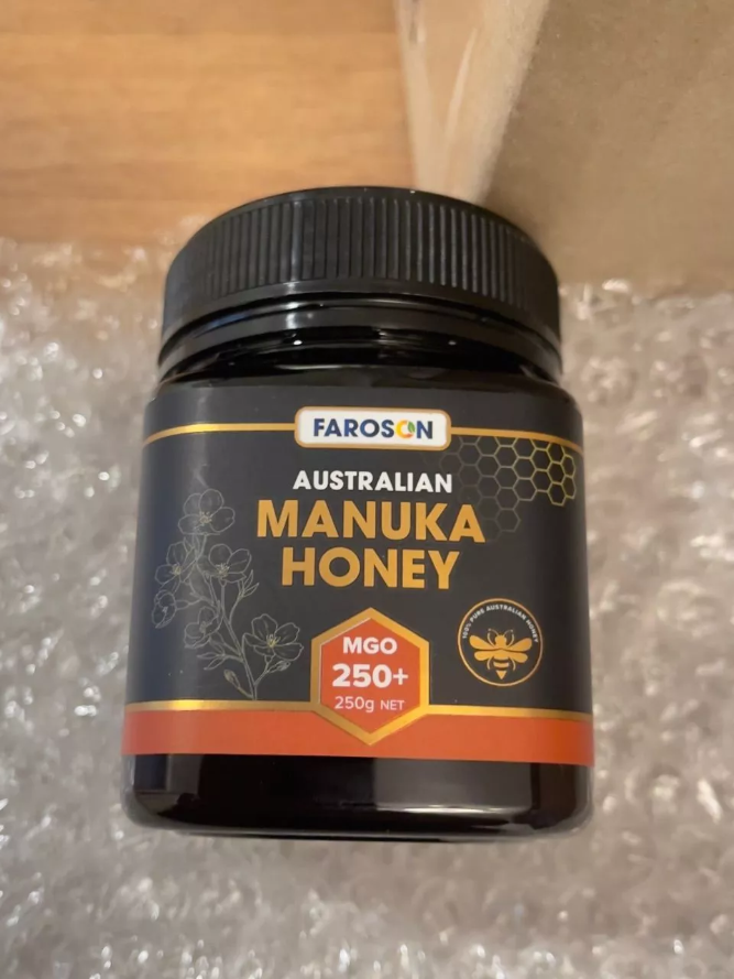 Jar of Farson Australian Manuka Honey on a textured surface